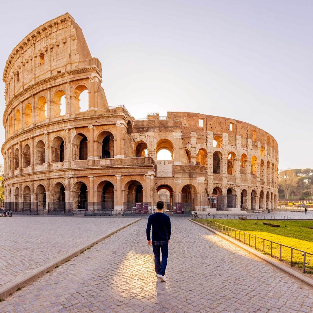 Morning light through the ancient arches of the Colosseum in Rome